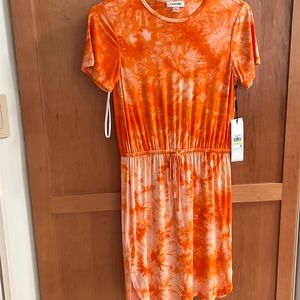 Calvin Klein size 4, orange and white elastic waist dress new with tags